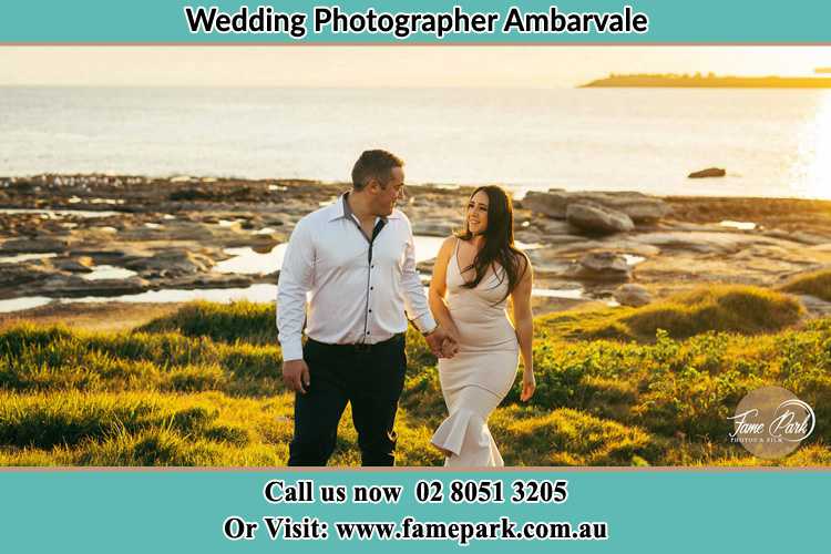 Photo of the Groom and the Bride walking near the lake Ambarvale NSW 2560