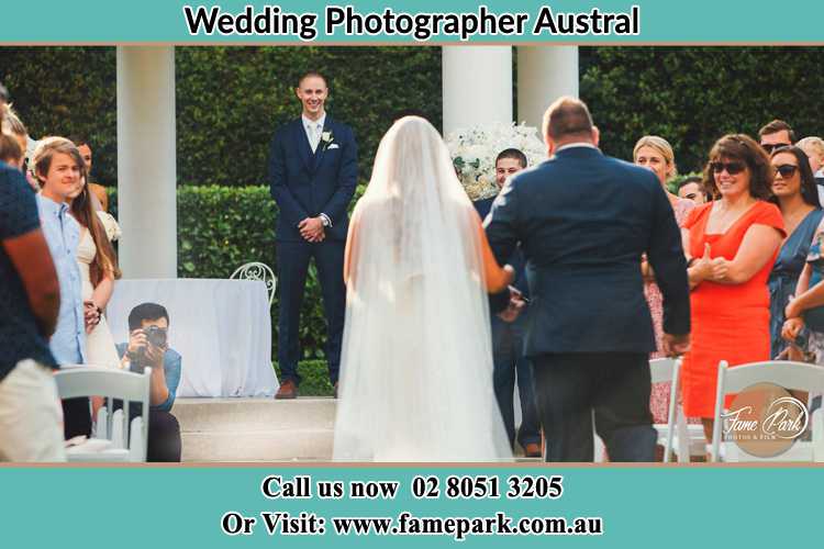 Photo of the Bride with her father walking the aisle Austral NSW 2179