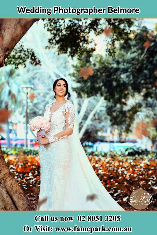 Photo of the Bride holding flower bouquet at the garden Belmore NSW 2192