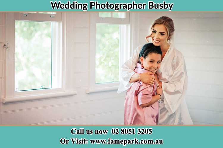 Photo of the Bride hugging the flower girl Busby NSW 2168