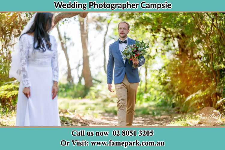 Photo of the Groom bringing flower to the Bride Campsie NSW 2194