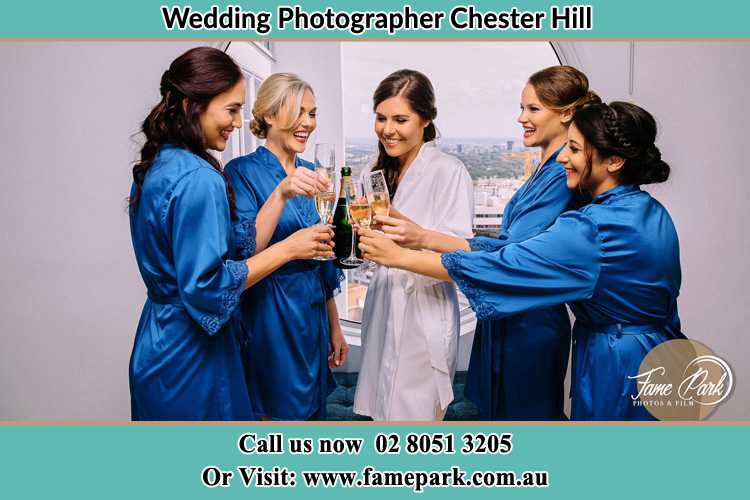 Photo of the Bride and the bridesmaids having wine Chester Hill NSW 2162