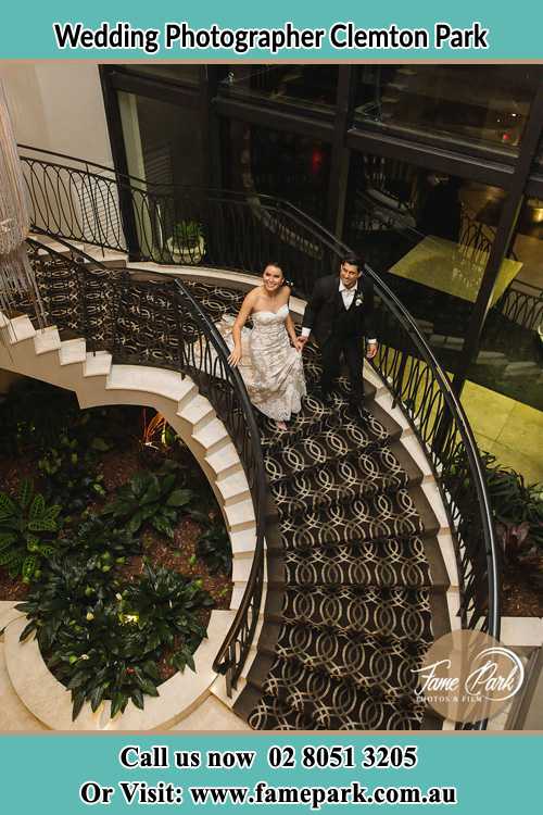 Photo of the Bride and the Groom going down the stair Clemton Park NSW 2206