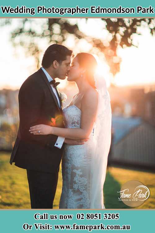 Photo of the Groom and the Bride kissing at the yard Edmondson Park NSW 2174