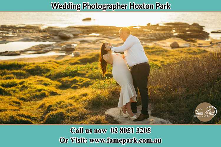 Photo of the Bride and the Groom dancing near the lake Hoxton Park NSW 2171