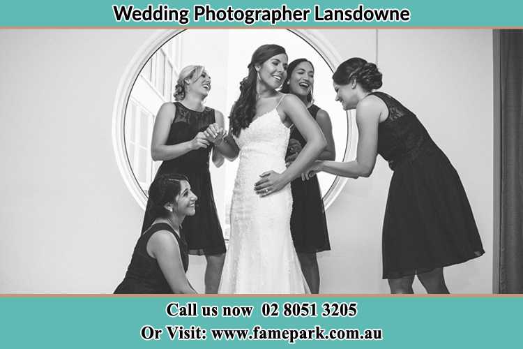 Photo of the Bride and the bridesmaids near the window Lansdowne NSW 2430