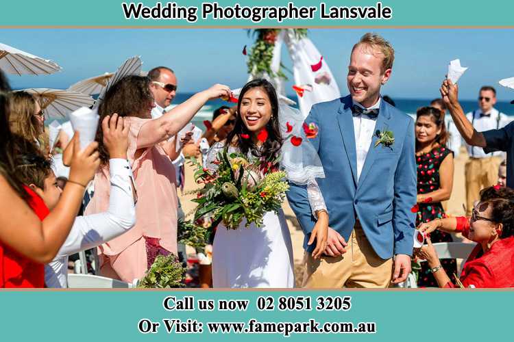 Photo of the Bride and the Groom showering flower petal by the visitors Lansvale NSW 2166