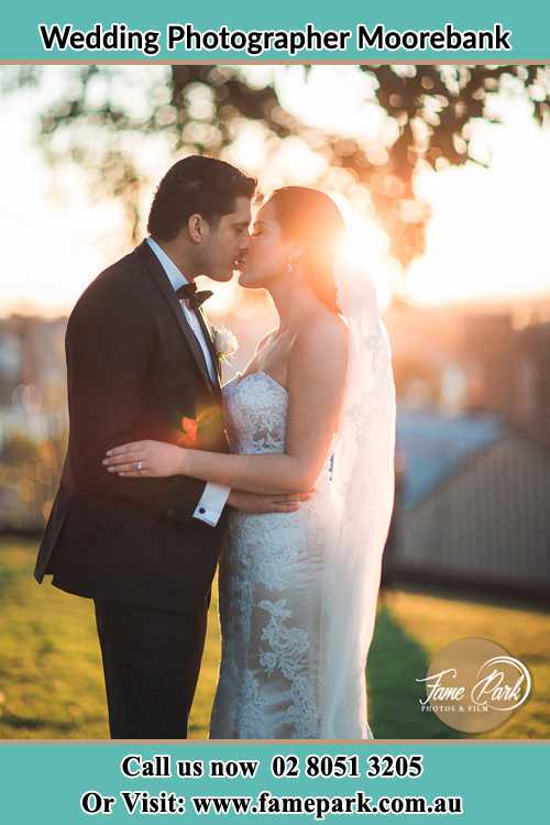 Photo of the Groom and the Bride kissing at the yard Moorebank NSW 2170