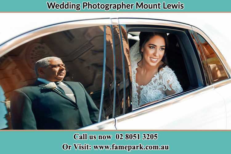 Photo of the Bride inside the bridal car with her father standing outside Mount Lewis NSW 2190