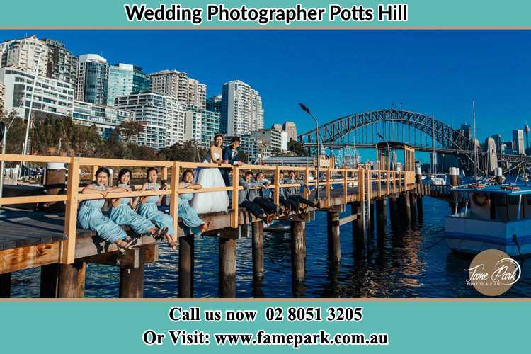 Photo of the Groom and the Bride with the entourage at the bridge Potts Hill NSW 2143