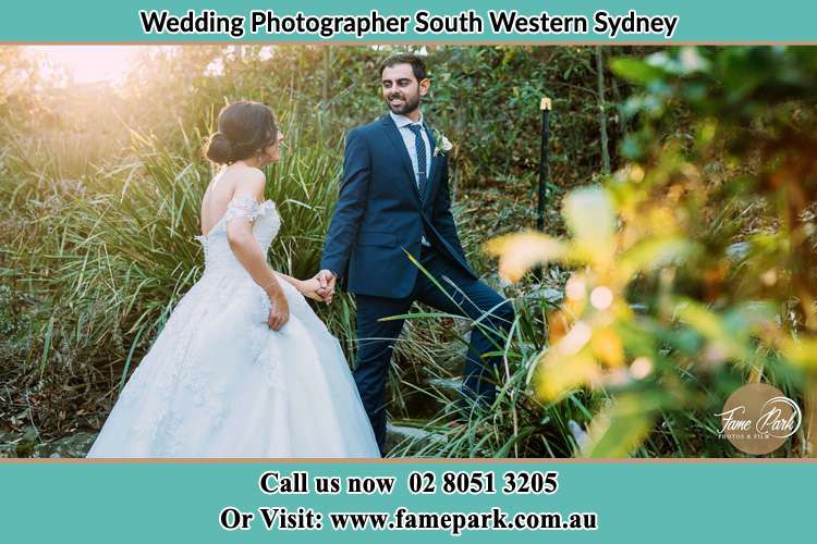 The couple holding hands in the garden South Western Sydney