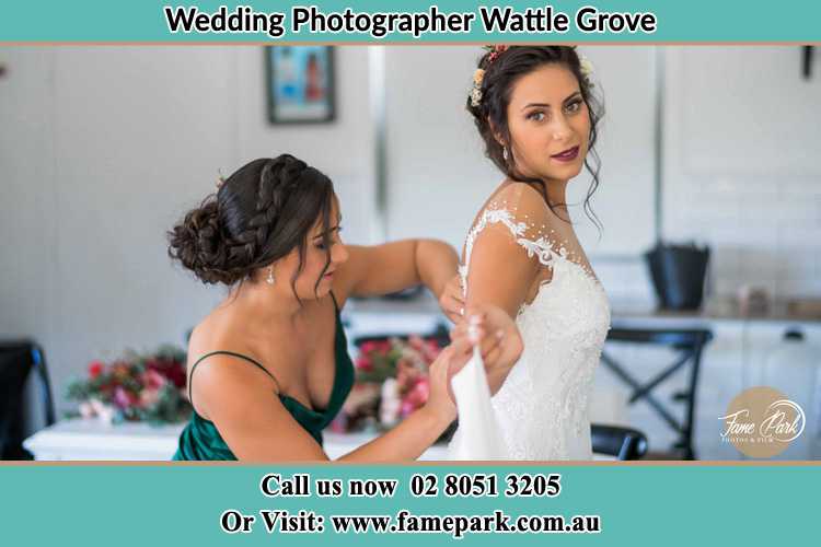 Photo of the Bride and the bridesmaid getting ready Wattle Grove NSW 2713