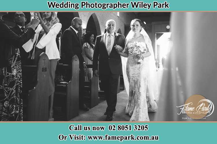 Photo of the Bride with her father walking the aisle Wiley Park NSW 2195