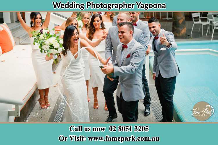 Photo of the Groom and the Bride celebrating with the secondary sponsors Yagoona NSW 2199